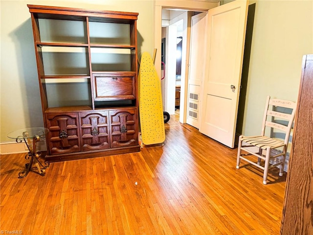 bedroom with light hardwood / wood-style floors