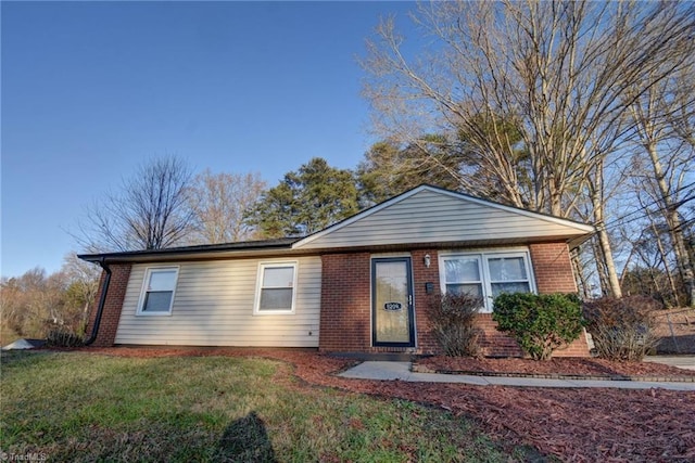 view of front of property with a front lawn