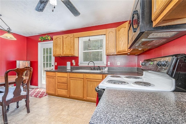 6517 Benson Ln, Pfafftown, NC 27040 - kitchen with white range with electric cooktop, a ceiling fan, dark countertops, pendant lighting, and a textured ceiling