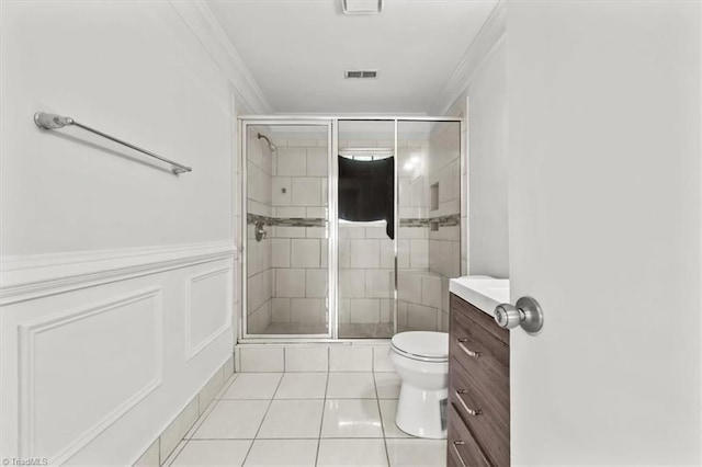 3523 Riverside Dr, Greensboro, NC 27406 - full bath with toilet, crown molding, tile patterned floors, and a shower stall