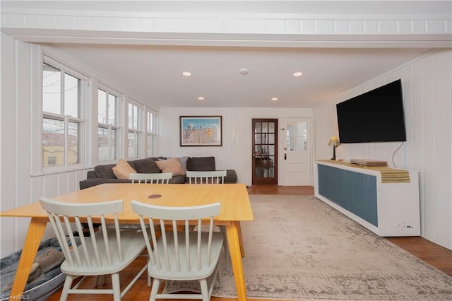 dining area featuring breakfast area, recessed lighting, and wood finished floors