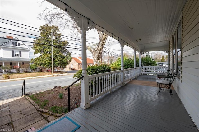 wooden deck featuring a porch