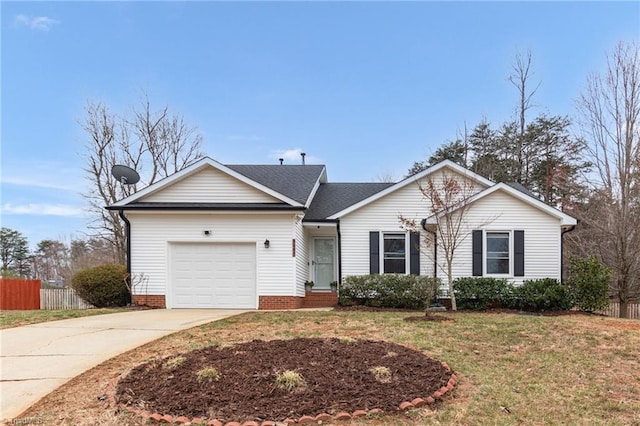 single story home with a front yard, concrete driveway, a garage, and fence