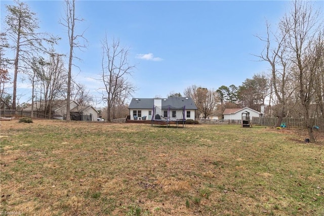 view of yard featuring a deck and a fenced backyard