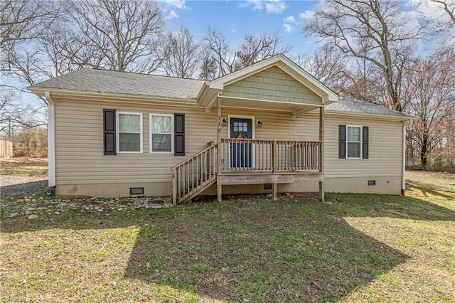 view of front of home with a shingled roof, a front lawn, covered porch, and crawl space