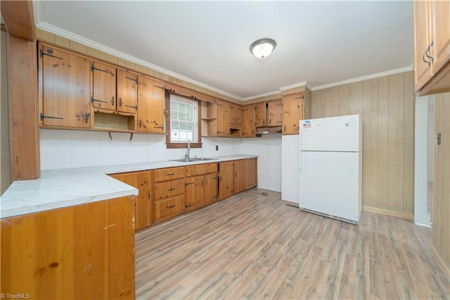 4065 Leo St, Winston-Salem, NC 27105 - kitchen featuring freestanding refrigerator, open shelves, a sink, under cabinet range hood, and brown cabinets