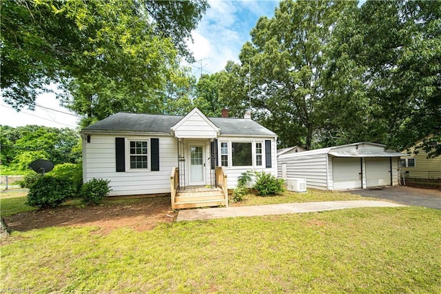 4065 Leo St, Winston-Salem, NC 27105 - view of front of home with a front yard and driveway
