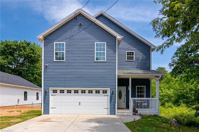 5035 Scenic Dr, Winston-Salem, NC 27105 - traditional home with a porch, driveway, and a garage