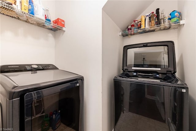2711 Chari Park Ln, Walkertown, NC 27051 - laundry area with washing machine and dryer and tile patterned floors
