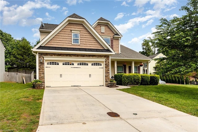 2711 Chari Park Ln, Walkertown, NC 27051 - craftsman house with concrete driveway, stone siding, and a shingled roof