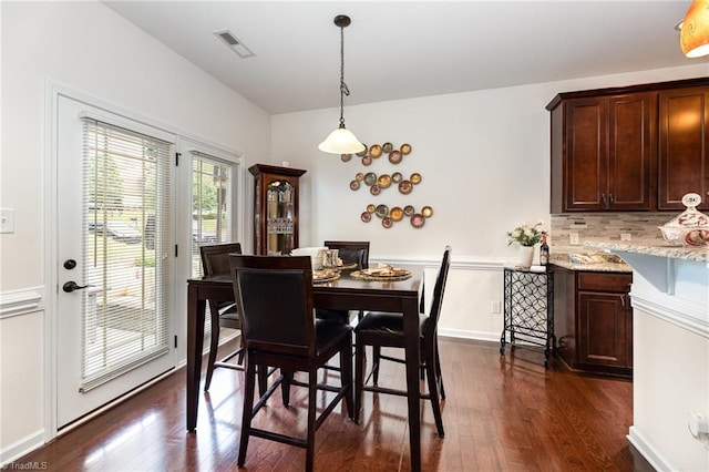 2711 Chari Park Ln, Walkertown, NC 27051 - dining space with dark wood-type flooring
