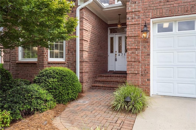 property entrance with a garage