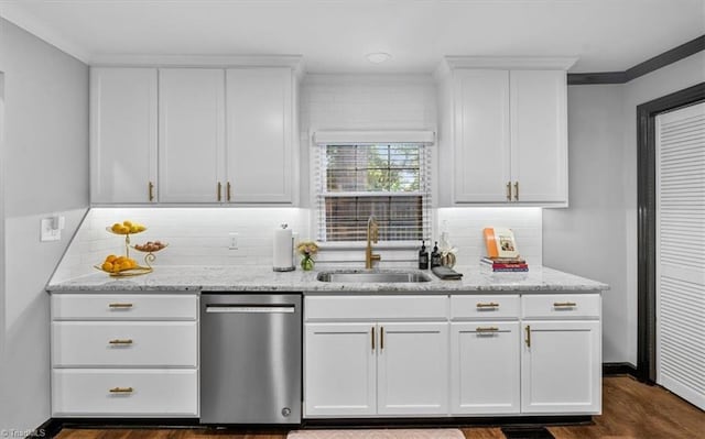 1449 NC Highway 150 W, Summerfield, NC 27358 - kitchen with stainless steel dishwasher, white cabinetry, light stone countertops, backsplash, and crown molding