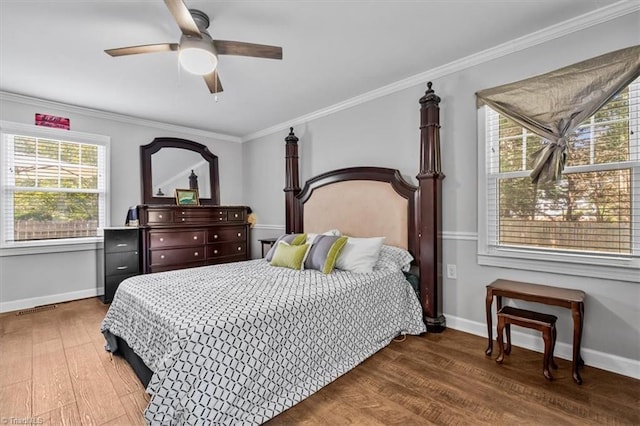 1449 NC Highway 150 W, Summerfield, NC 27358 - bedroom with wood finished floors, crown molding, and a ceiling fan