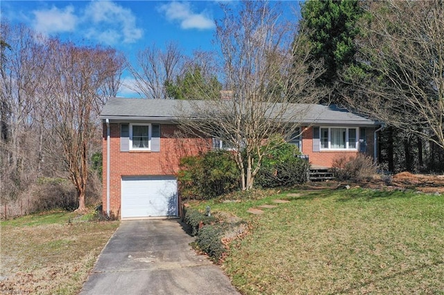 ranch-style home with brick siding, concrete driveway, a garage, and a front yard