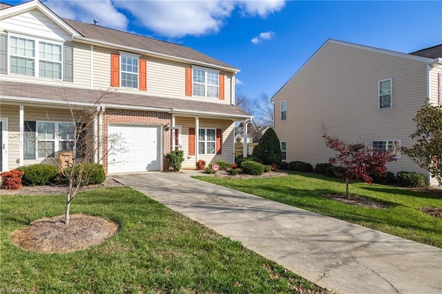 view of front of property featuring a garage and a front yard