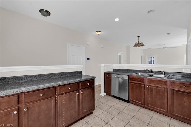 kitchen with sink, light tile patterned floors, dark brown cabinets, decorative light fixtures, and stainless steel dishwasher