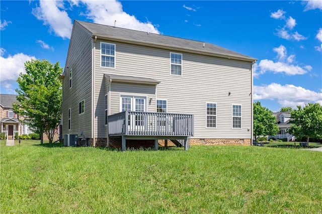 back of house with central air condition unit, a yard, crawl space, and a deck