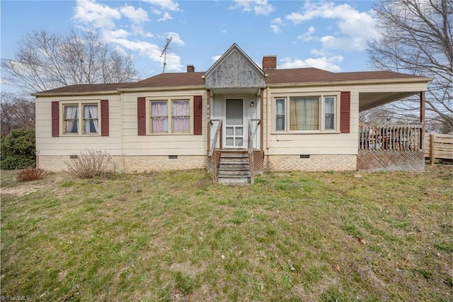 view of front of house with crawl space, a chimney, and a front lawn