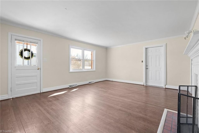 entryway featuring crown molding and dark hardwood / wood-style floors