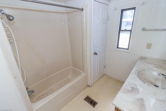 full bathroom featuring visible vents, vanity, and bathtub / shower combination