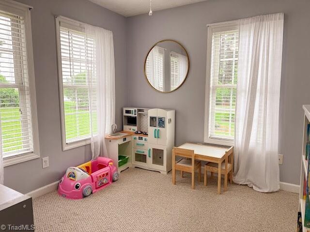 525 Bennett St, Mount Airy, NC 27030 - playroom with carpet floors and baseboards