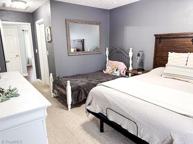 525 Bennett St, Mount Airy, NC 27030 - bedroom featuring light carpet