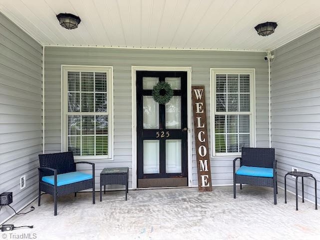 525 Bennett St, Mount Airy, NC 27030 - view of exterior entry featuring a porch