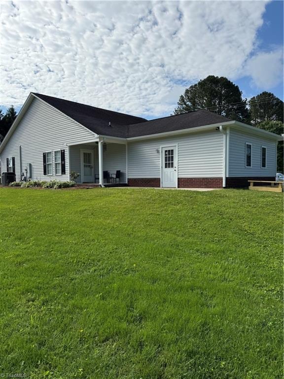 525 Bennett St, Mount Airy, NC 27030 - back of house with a yard and central air condition unit