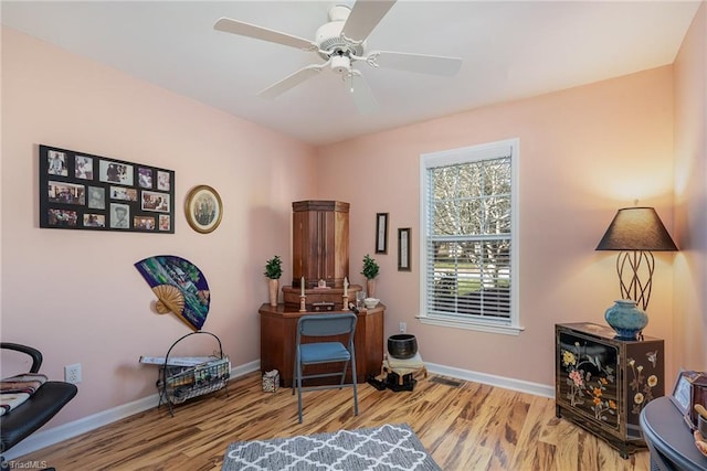 interior space featuring light hardwood / wood-style flooring and ceiling fan