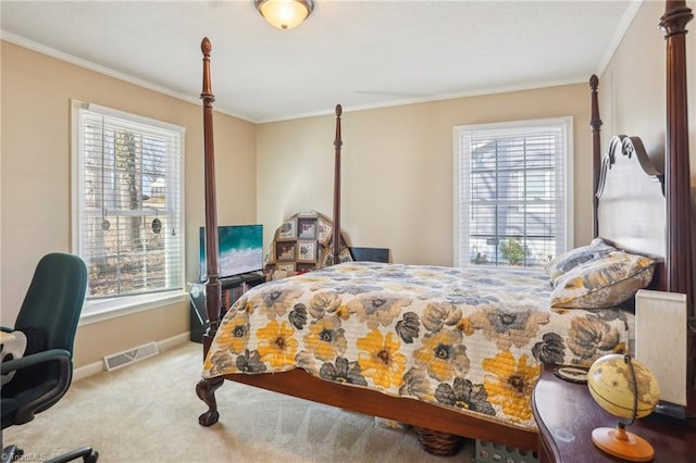 carpeted bedroom featuring ornamental molding