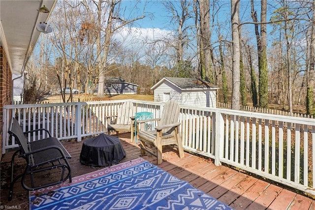 wooden deck with a shed