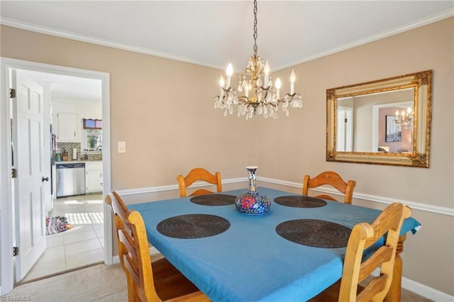 tiled dining space with crown molding and a notable chandelier