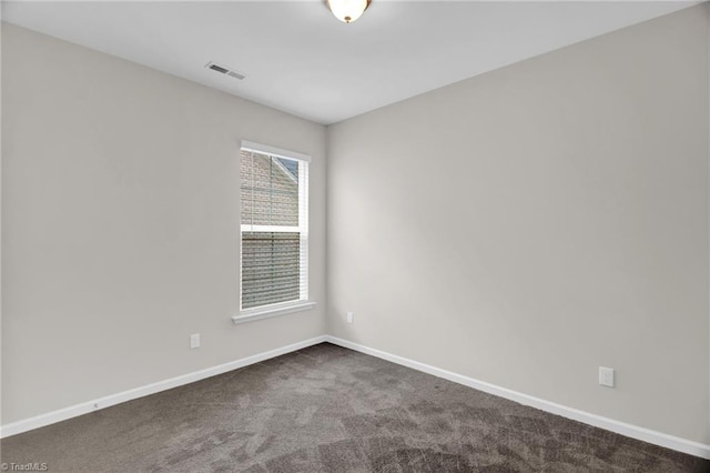 1442 Crestlawn Trl, Pfafftown, NC 27040 - empty room with visible vents, baseboards, and dark colored carpet