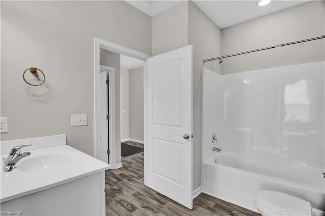 1442 Crestlawn Trl, Pfafftown, NC 27040 - full bathroom featuring baseboards, toilet, shower / bath combination, wood finished floors, and vanity