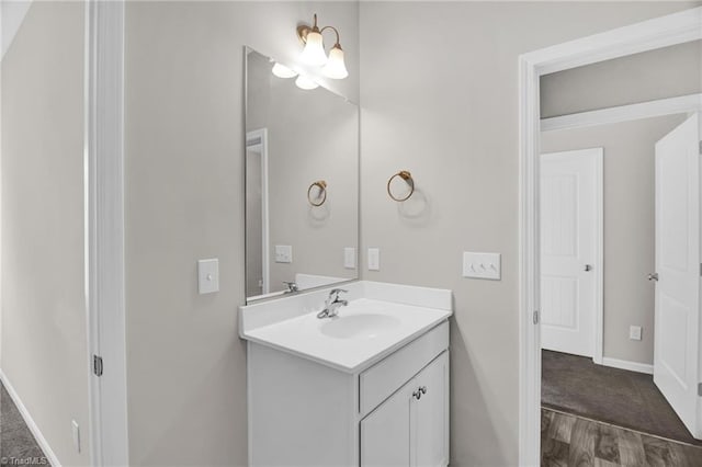 1442 Crestlawn Trl, Pfafftown, NC 27040 - bathroom with wood finished floors, vanity, and baseboards