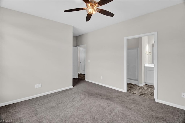 1442 Crestlawn Trl, Pfafftown, NC 27040 - unfurnished bedroom featuring carpet floors, baseboards, ceiling fan, and ensuite bathroom