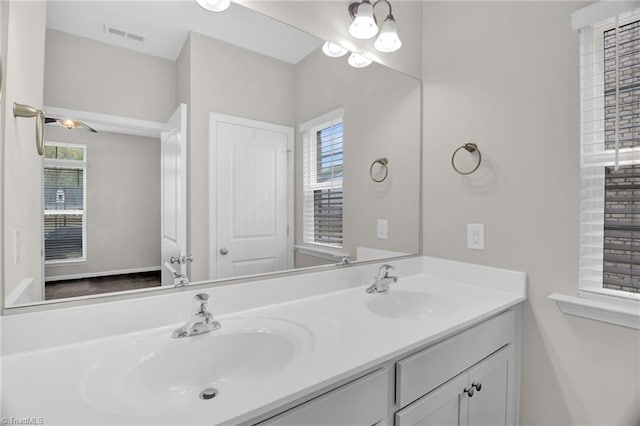1442 Crestlawn Trl, Pfafftown, NC 27040 - bathroom featuring a sink, visible vents, and double vanity