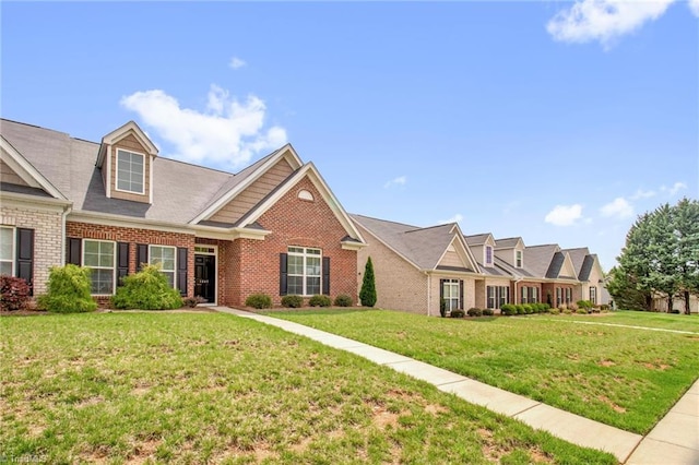 1442 Crestlawn Trl, Pfafftown, NC 27040 - view of front of home with brick siding and a front yard