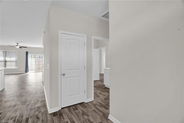 1442 Crestlawn Trl, Pfafftown, NC 27040 - hallway featuring dark wood-type flooring, baseboards, and visible vents