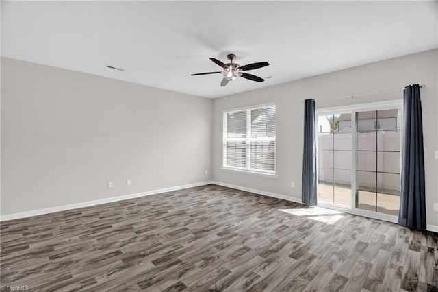 1442 Crestlawn Trl, Pfafftown, NC 27040 - unfurnished room featuring ceiling fan, baseboards, and wood finished floors