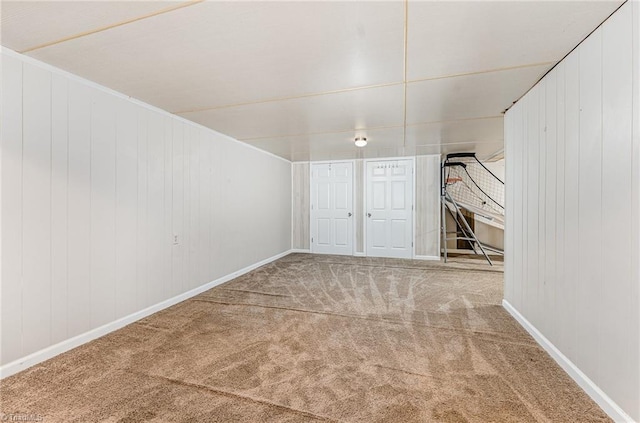basement with carpet and baseboards