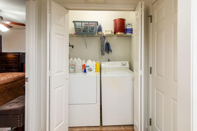 laundry room with laundry area, ceiling fan, and washing machine and clothes dryer