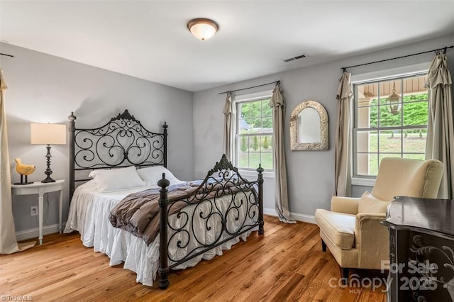 845 Montgomery Ct, Walnut Cove, NC 27052 - bedroom featuring wood finished floors and baseboards