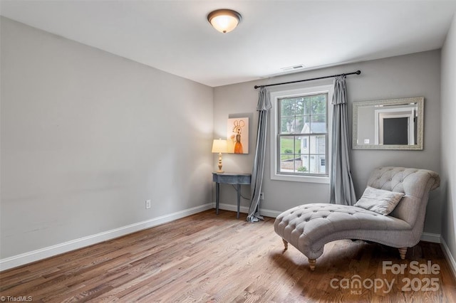 845 Montgomery Ct, Walnut Cove, NC 27052 - sitting room featuring wood finished floors and baseboards
