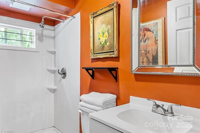 845 Montgomery Ct, Walnut Cove, NC 27052 - bathroom featuring a shower, vanity, and toilet