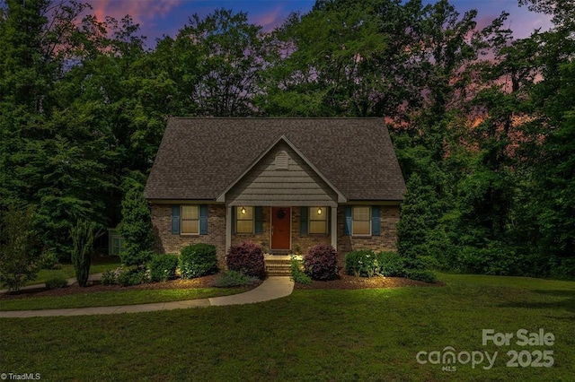 845 Montgomery Ct, Walnut Cove, NC 27052 - view of front facade with a front yard, a porch, and roof with shingles