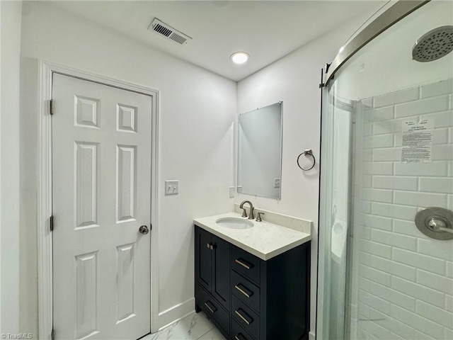 1101 Forrest St, High Point, NC 27262 - bathroom featuring a stall shower, marble finish flooring, vanity, and baseboards