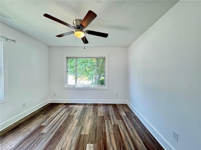 1101 Forrest St, High Point, NC 27262 - empty room featuring dark wood-style floors, baseboards, and ceiling fan