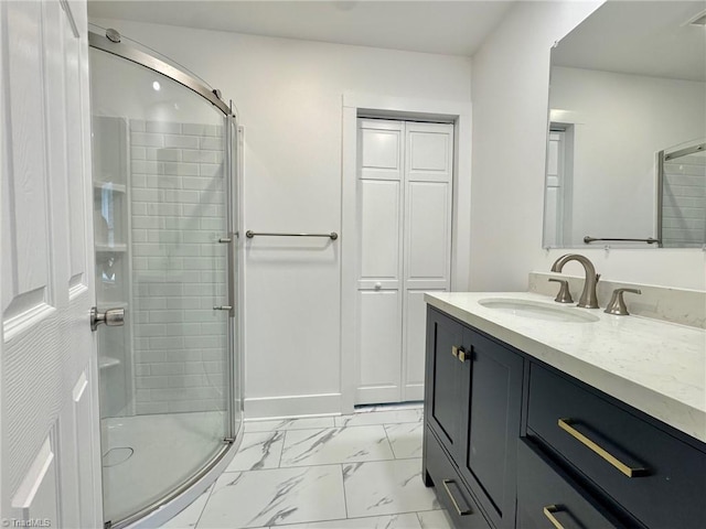 1101 Forrest St, High Point, NC 27262 - bathroom featuring a stall shower, vanity, and marble look tiles